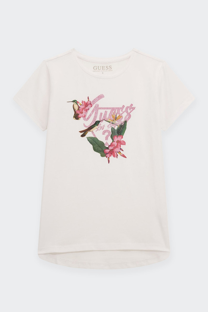 Girl's short-sleeved T-shirt made of cotton with elongated back. neckline at the base of the neck and spring-inspired logo print
