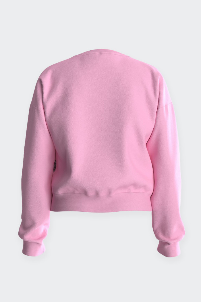 Girl's sweatshirt made of soft 100% cotton. Crew neck, soft cut, elasticated ribbed cuffs and hem and maxi print logo detail on 