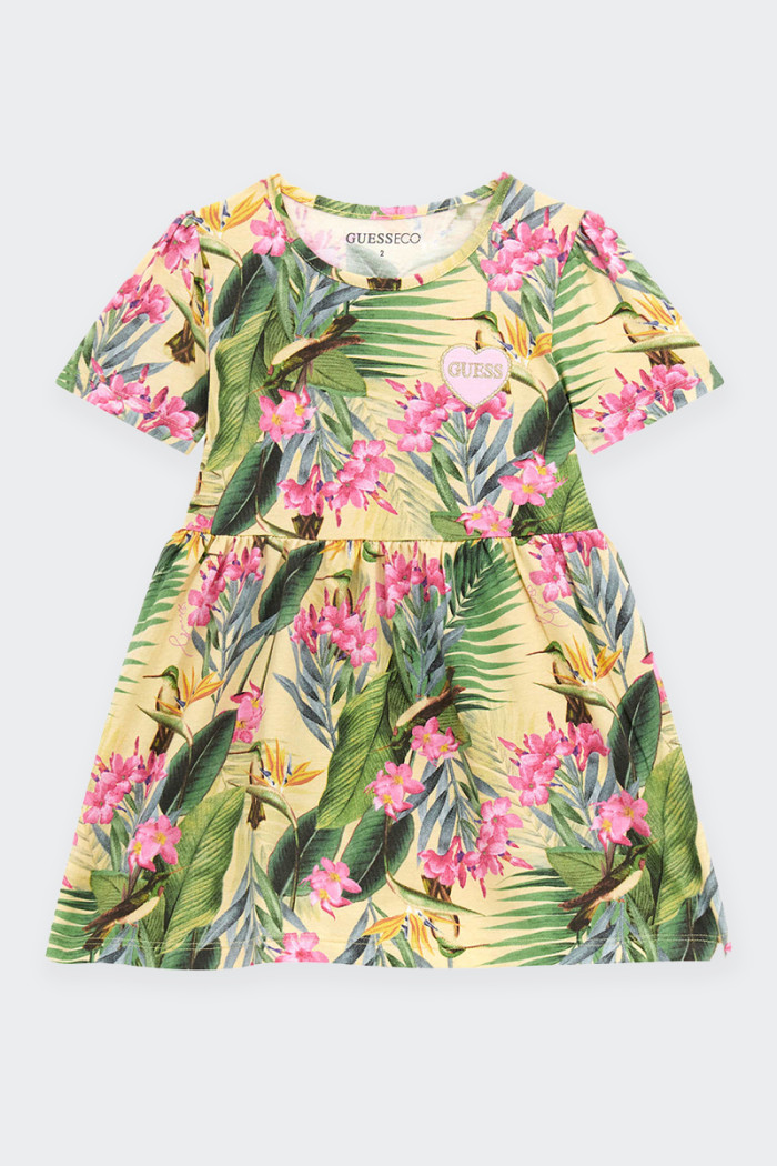 Girl's dress with floral print, short sleeves and round neckline. The cut out at the waist and the closed bottom add a touch of 