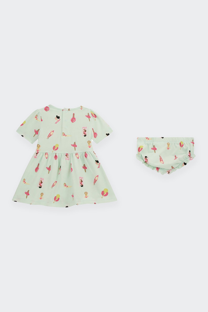 cotton baby dress and panty set in a delicate print. this baby dress features an embroidered logo on the front and a cut-out wai