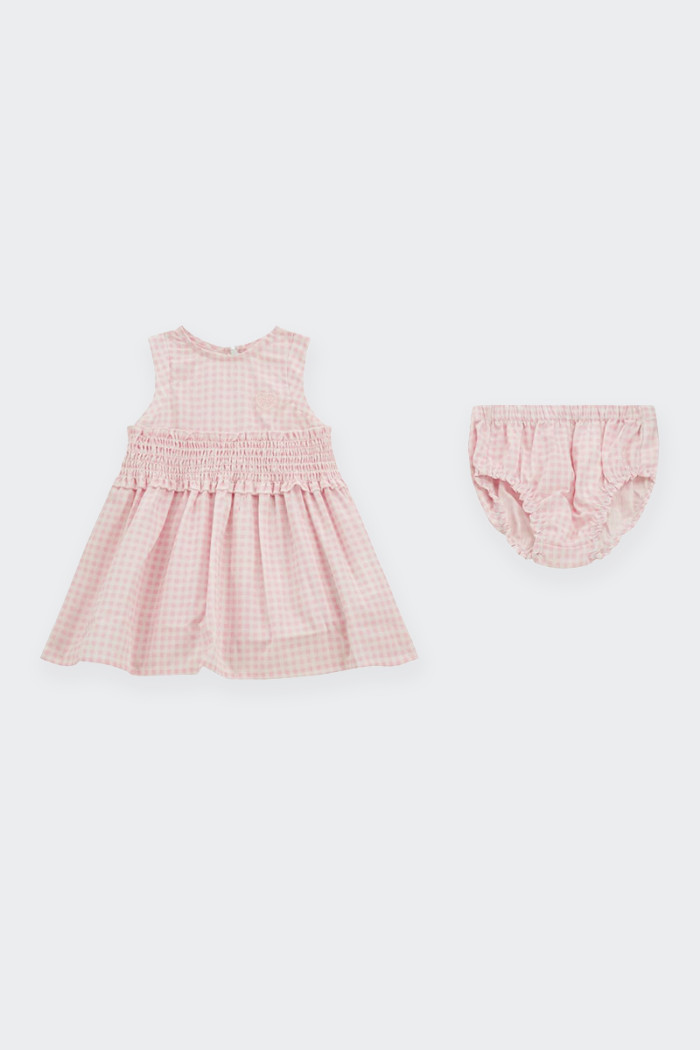 baby dress and panty set perfect for every ceremony. Made of soft cotton, the dress has a gathered waist and a back zip fastenin