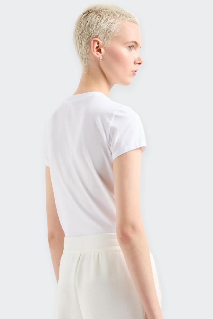 T-shirt da donna slim fit realizzata in jersey di cotone stretch e personalizzata dal logo lettering composto da luminosi glitte