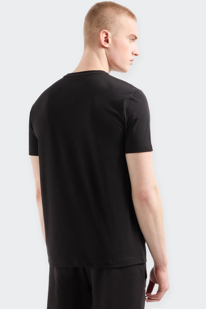 Men's short-sleeved crew-neck T-shirt with an essential design. The model, with a regular fit, is characterized by the customiza
