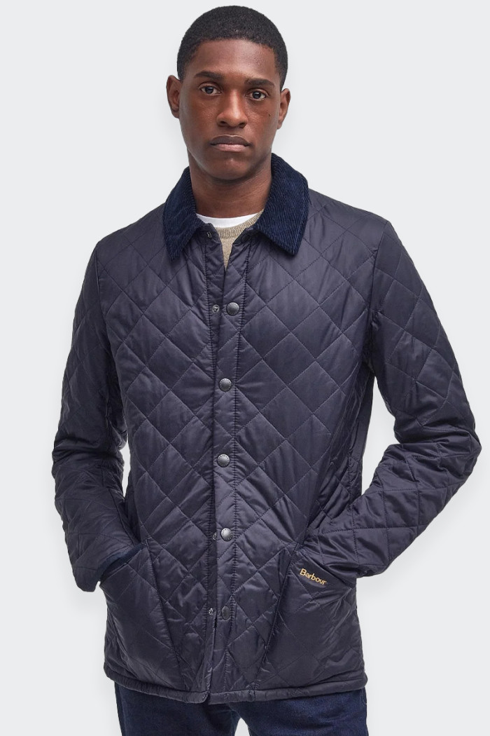 men's jacket ideal for mid-season or transitional periods. made with a wind-resistant synthetic exterior, quilted with warm batt
