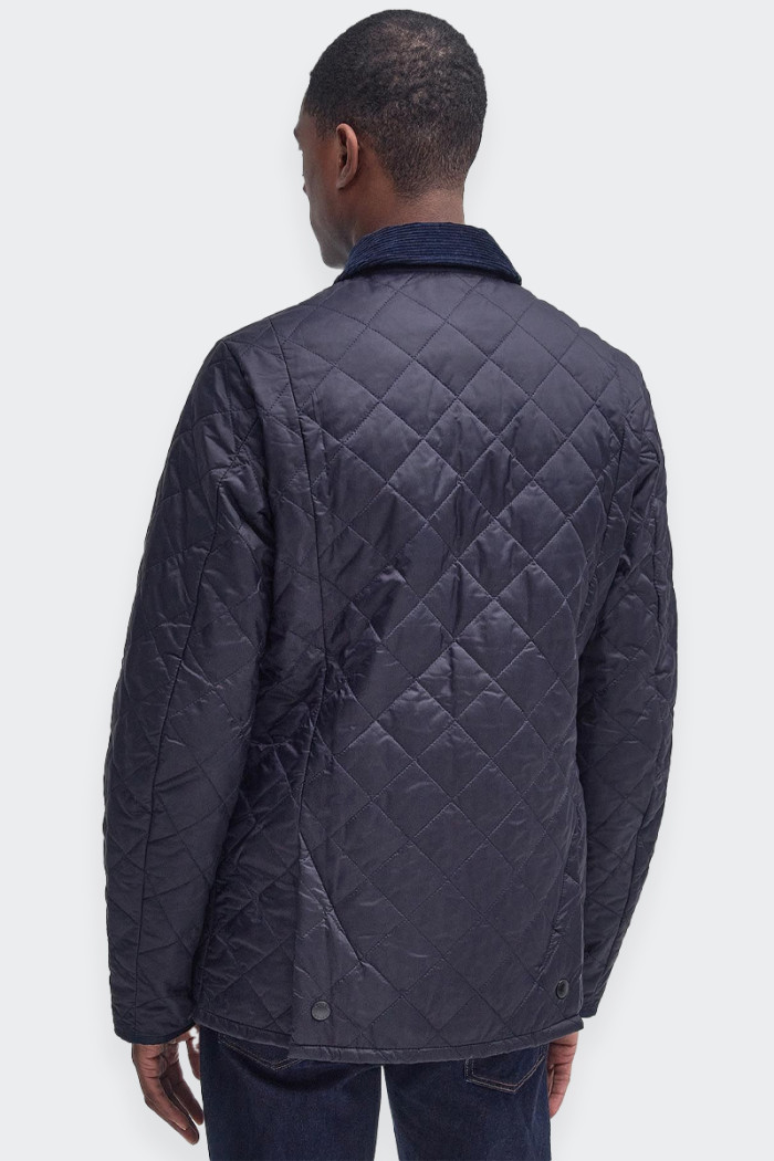 men's jacket ideal for mid-season or transitional periods. made with a wind-resistant synthetic exterior, quilted with warm batt