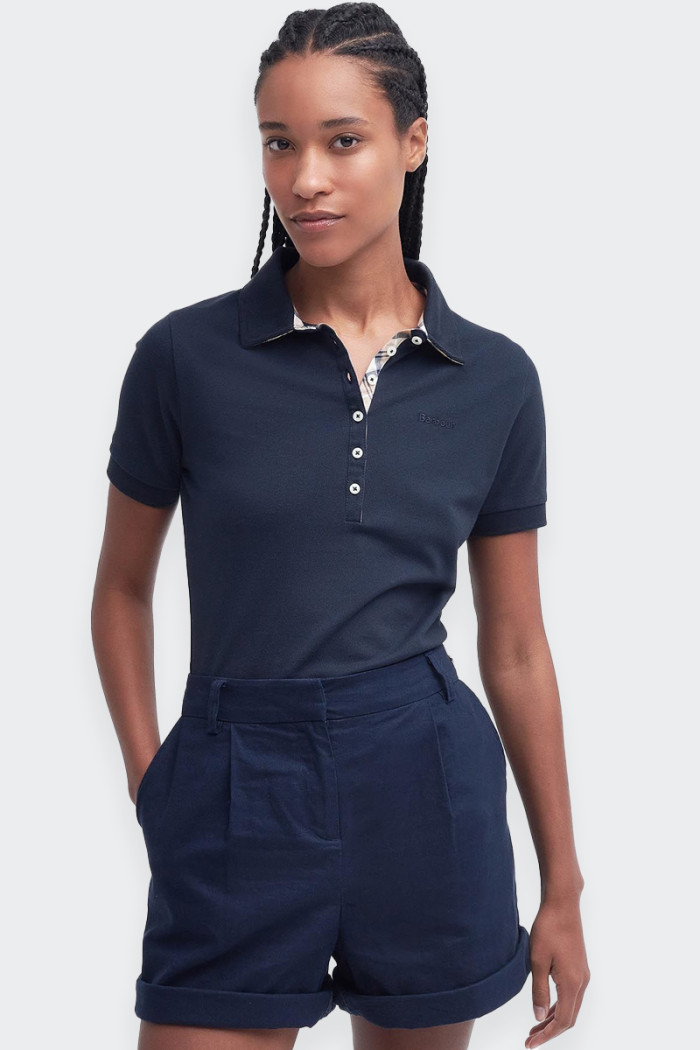 women's short-sleeved cotton polo shirt. ribbed collar and cuffs, a deep button placket and a tartan trim on the inside of the c