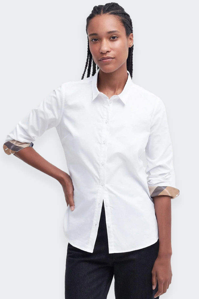women's long sleeve shirt Made from a soft cotton oxford fabric, this elegant shirt is embellished with details that add a touch