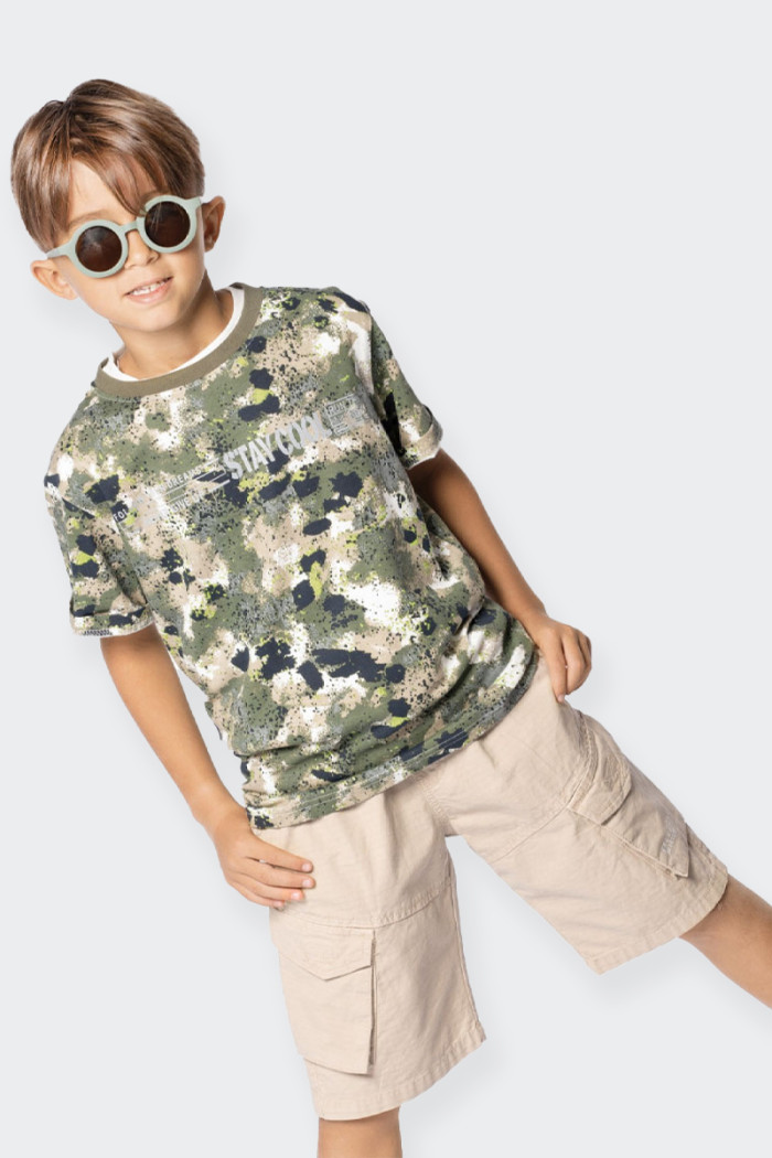 children's cargo bermuda shorts made from cotton. adjustable drawstring waist, side and back pockets and the iconic cargo pocket