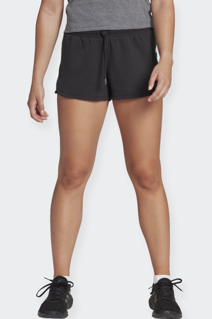 Women's sports shorts with a stretchy construction and the overlapping side seams of these adidas shorts give you the freedom of
