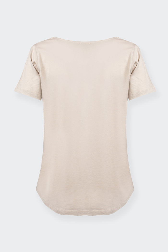 T-shirt oversize da donna realizzata in cotone elasticizzato. Scritta logo frontale. stile casual.