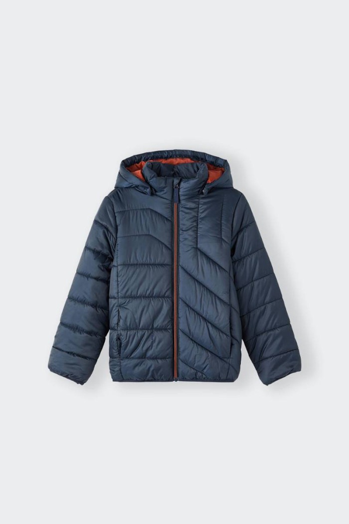 blue jacket with waterproof fabric for children by Name It. Front zip fastener with protection to prevent the zip from sticking 