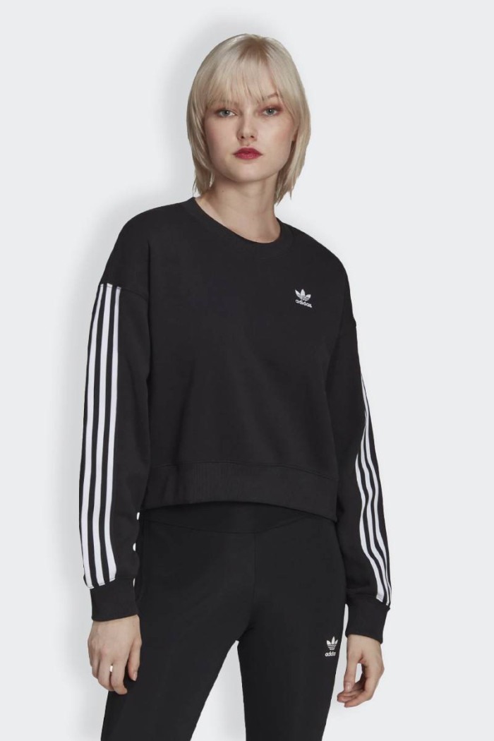 Women's black ribbed crewneck sweatshirt made of 100% sustainable cotton. Featuring a loose fit, contrasting logo on the chest a