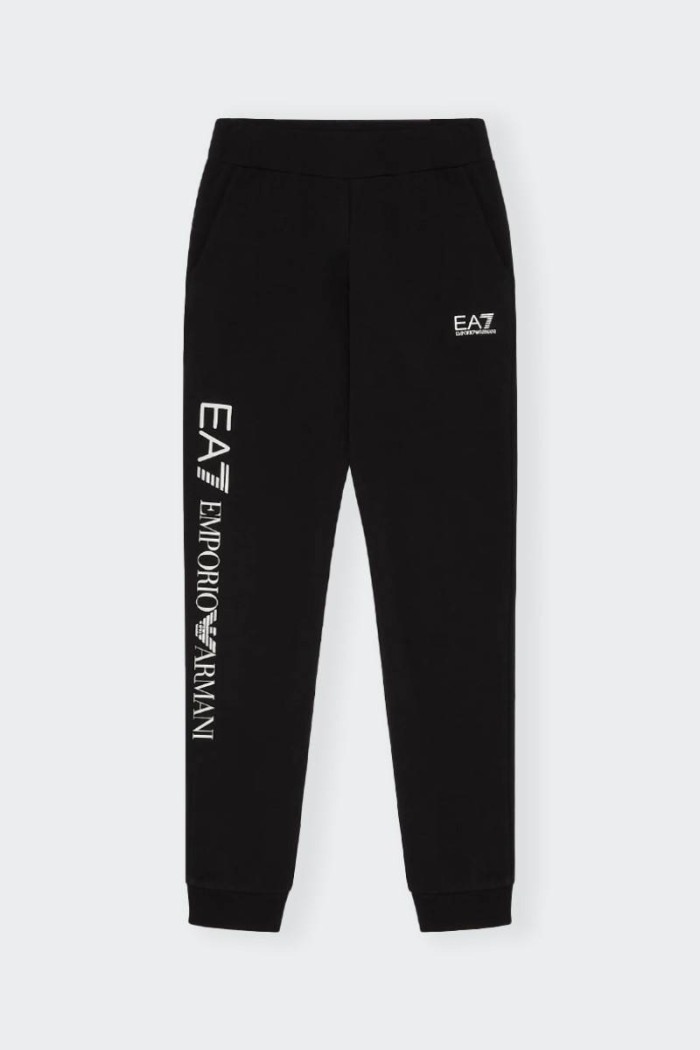 Realizzati in morbido cotone elasticizzato, questi pantaloni jogger Emporio Armani EA7 regular fit per bambina e teenager sono p