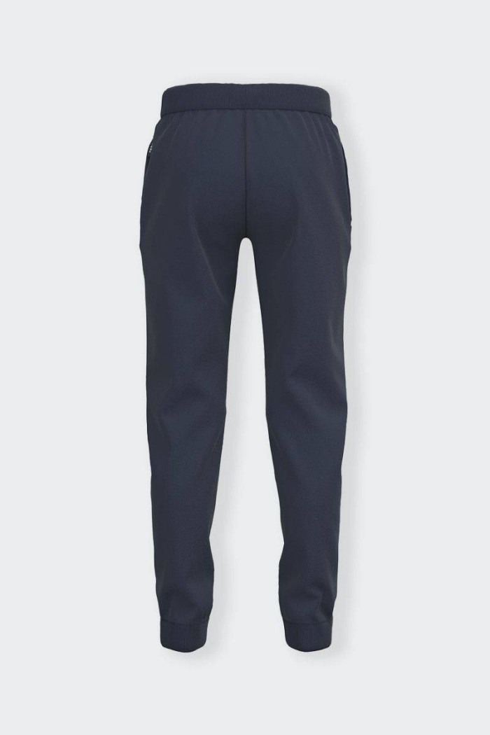 Practical regular-fit tracksuit trousers with a sporty and casual cut for children and teenagers. Adjustable drawstring waistban