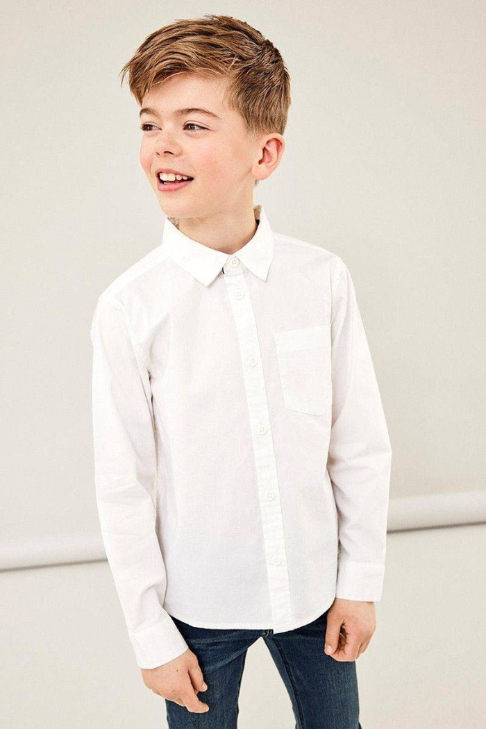 regular fit classic shirt in poplin fabric for children/teenagers. front fastening and button cuffs. front pocket with embroider