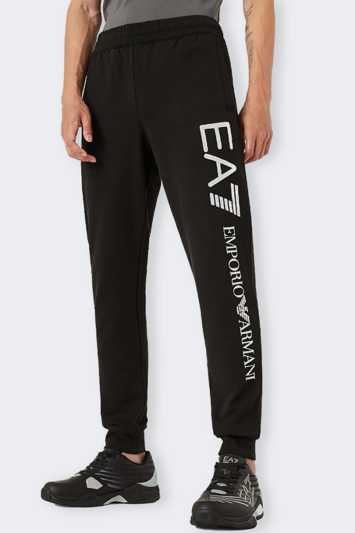 pantalone Emporio Armani EA7 di tuta neri da uomo in 100% cotone ideali per il tempo libero al training outdoor. due tasche late