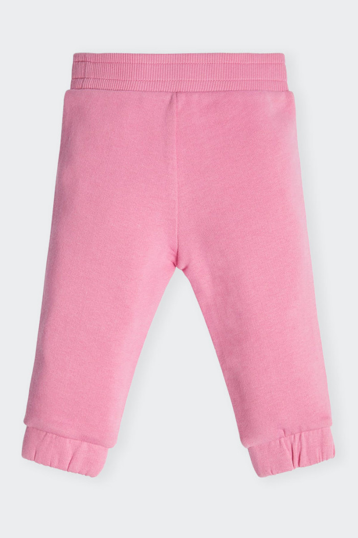 Pink sweatpants for girls made of 100% cotton with elastic waistband with drawstring. Comfortable fit to allow ample movement.