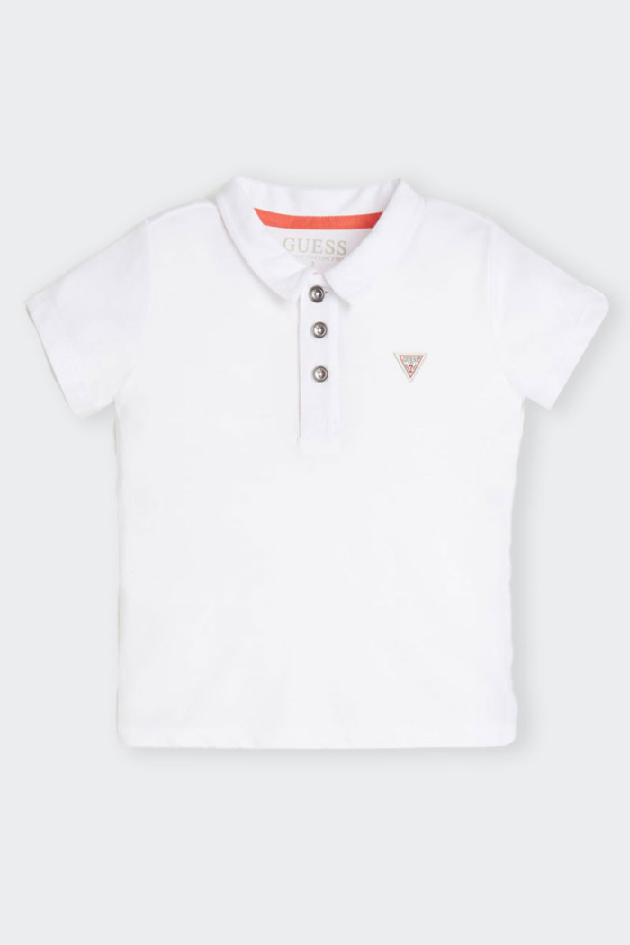 White cotton short-sleeve polo shirt for children. Pique fabric and classic collar. Facial button closure. Ideal for occasions o