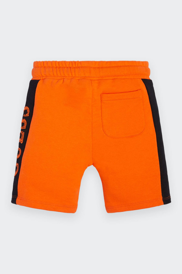 Orange cotton sweatpants shorts for children. Drawstring waist closure and convenient front pockets and one back pocket. Embroid