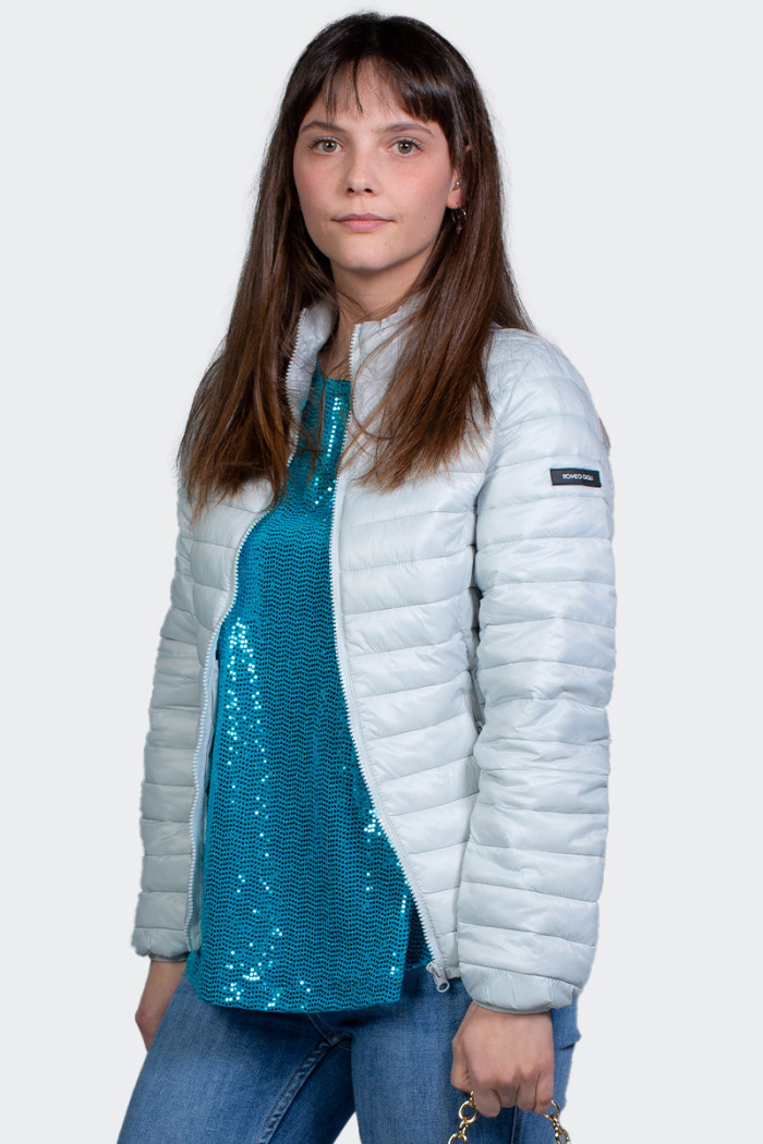Ice color 100 gram windproof and rainproof women's down jacket. Features practical front zippered and inside pockets for your mo