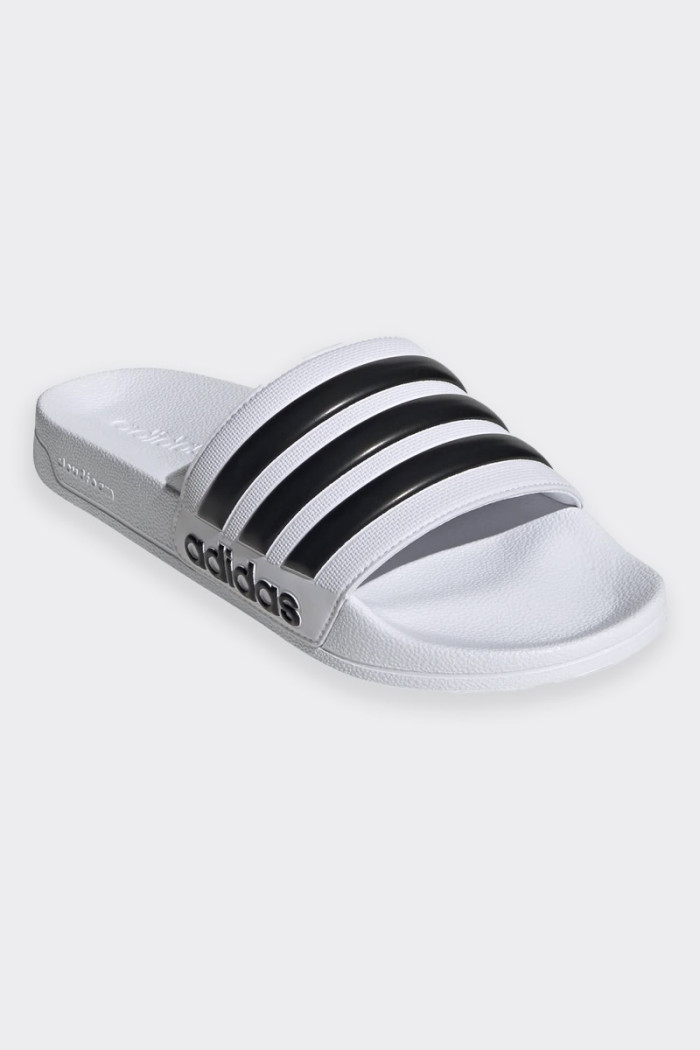 Adilette model slippers perfect for switching from the pool to the shower, or even the sofa at home. The slip-on design ensures 