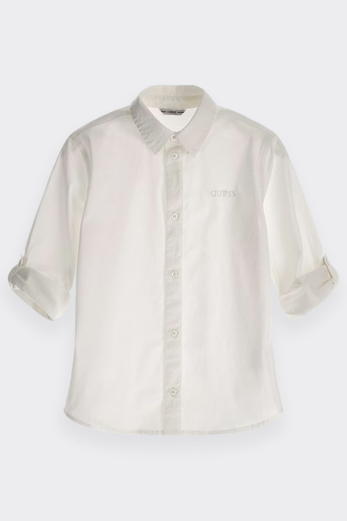 Child's and boy's shirt made of cotton blend. Classic collar and central button fastening. Adjustable sleeves and embroidered lo