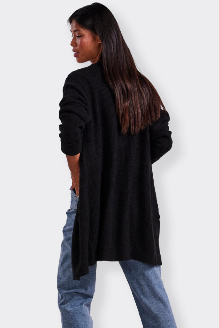 women's long cardigan made of a cotton blend. soft and warm with practical side pockets and v-neck. ideal for any time of day. s